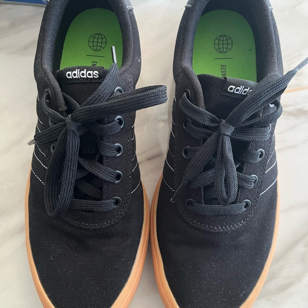 Adidas Black and Green Streamlined Sneakers